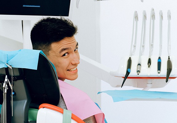 Smiling man in dentist’s chair