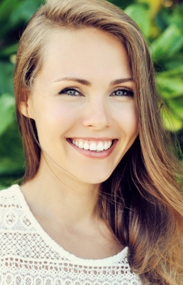 Woman sharing gorgeous smile after cosmetic dentistry