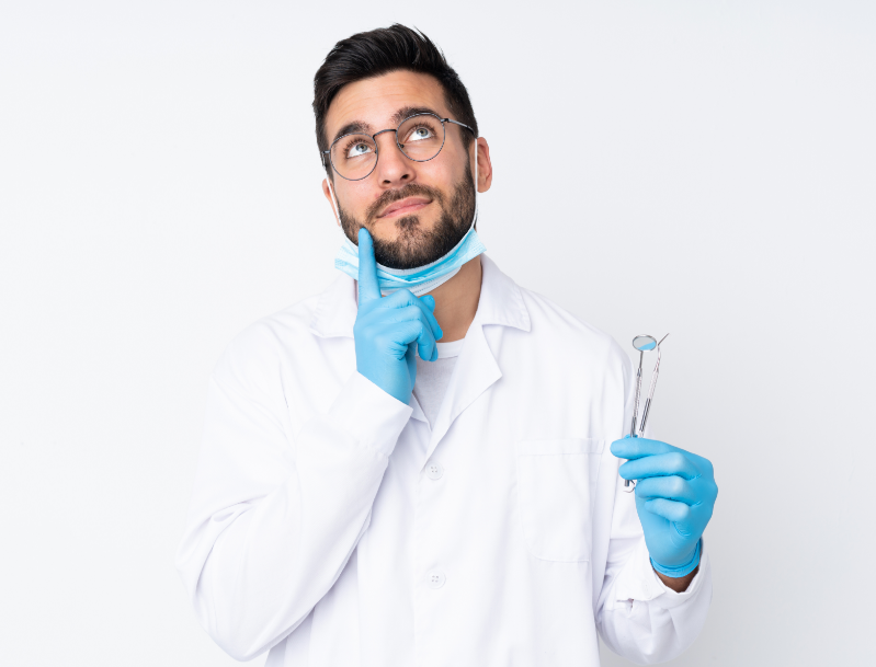 Dentist looking pensive